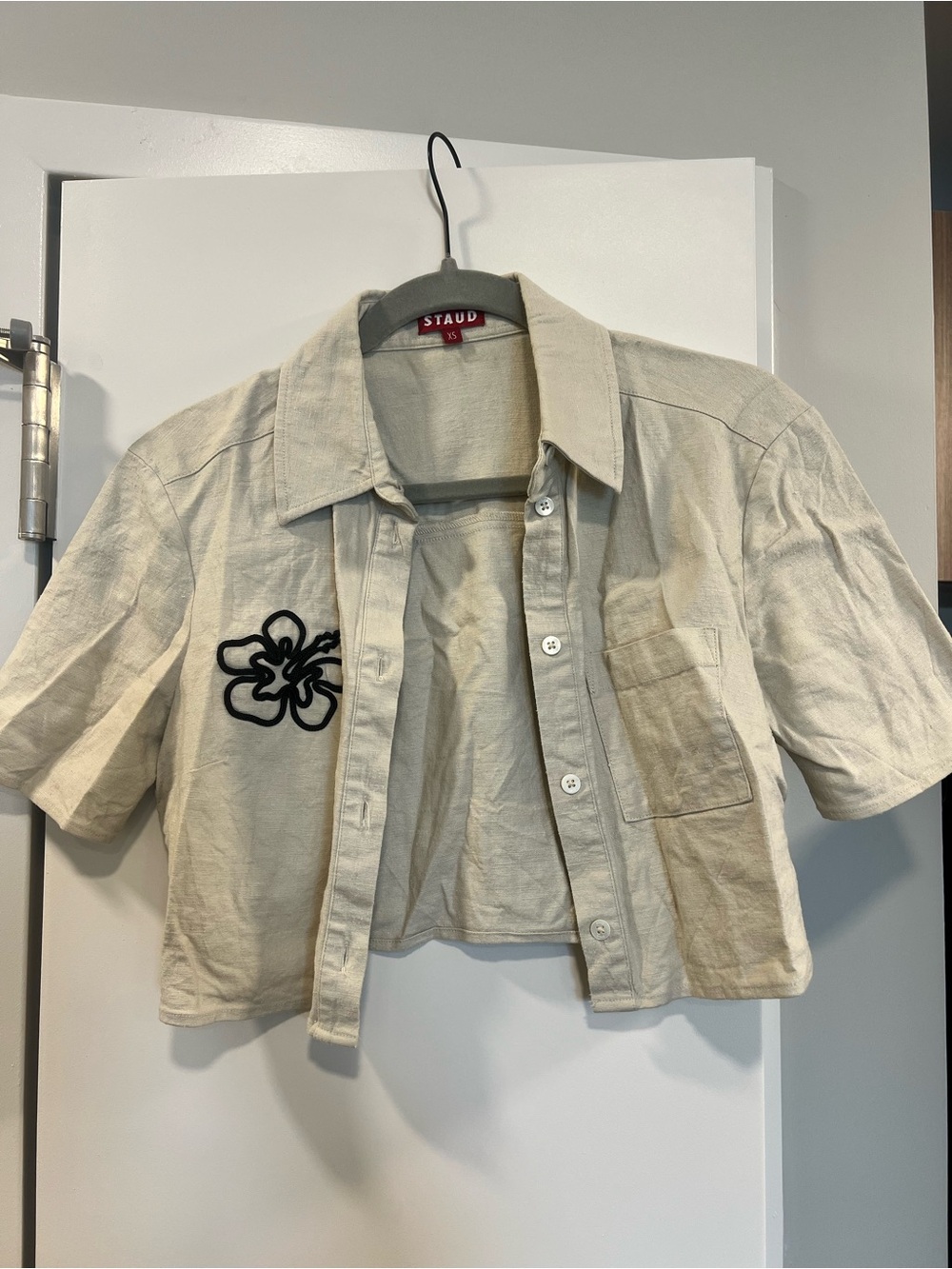 STAUD Natural Cropped Linen Button-Down Shirt with Black Floral Patch